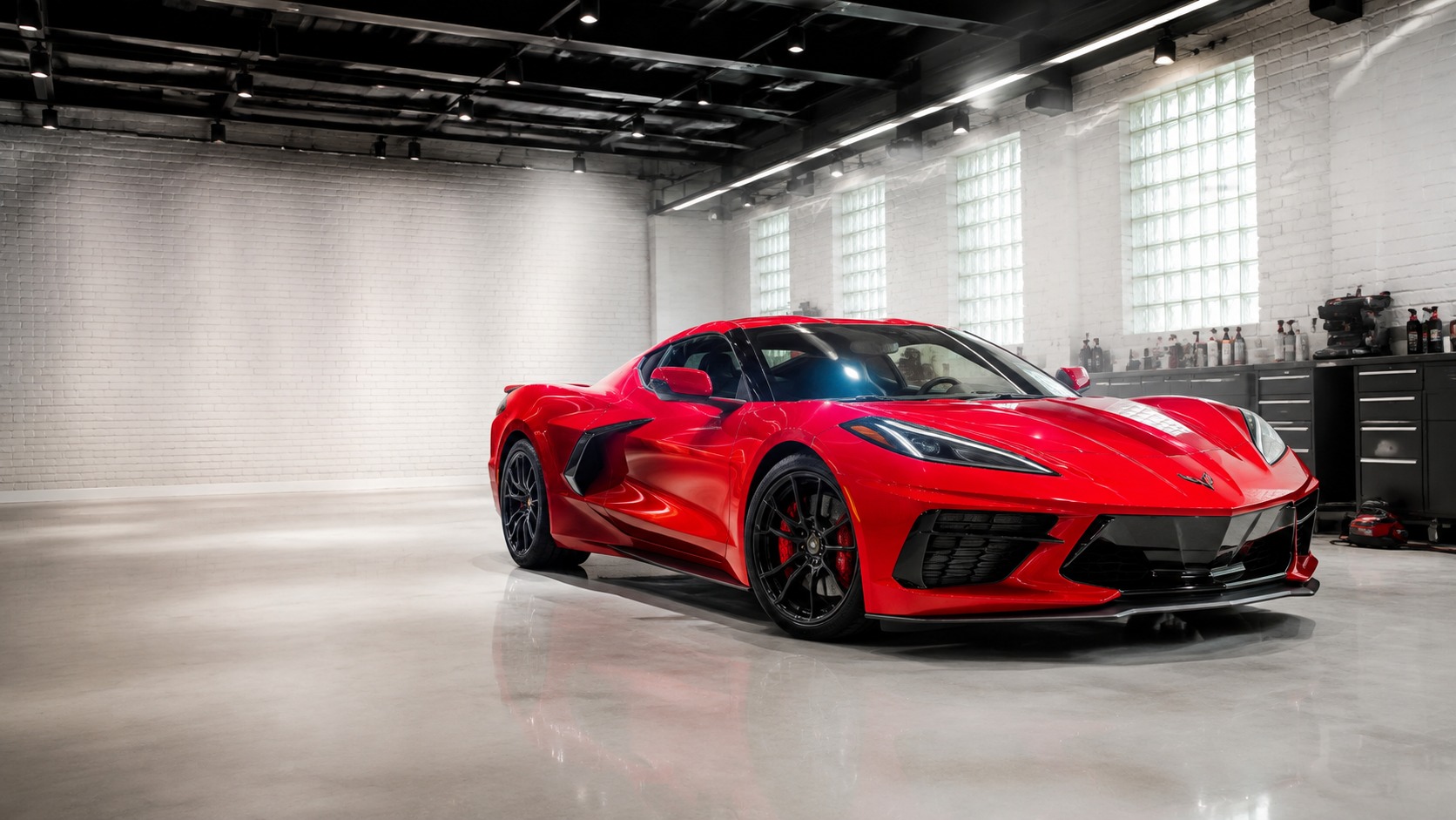 Red Corvette in the Mr Kleen Auto Spa detailing studio